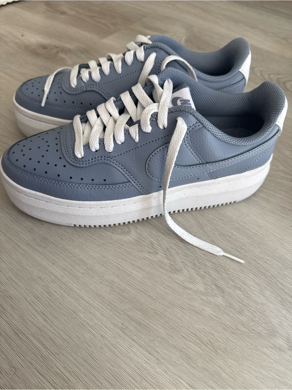 Nike Air Force 1 platform sneakers
- Light Blue and White